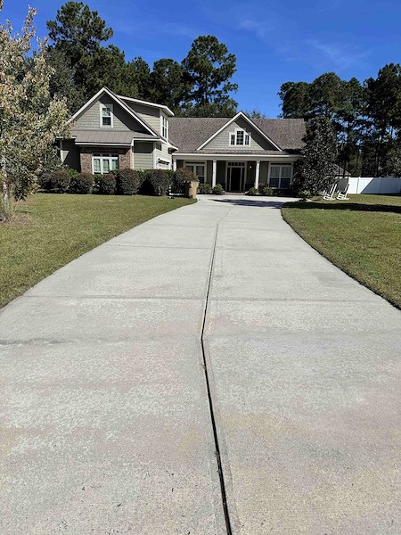 Driveway and sidewalk cleaning quick fixes to boost home value